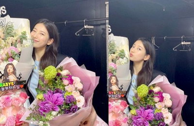 수지, 꽃다발 들고 활짝 '눈길'